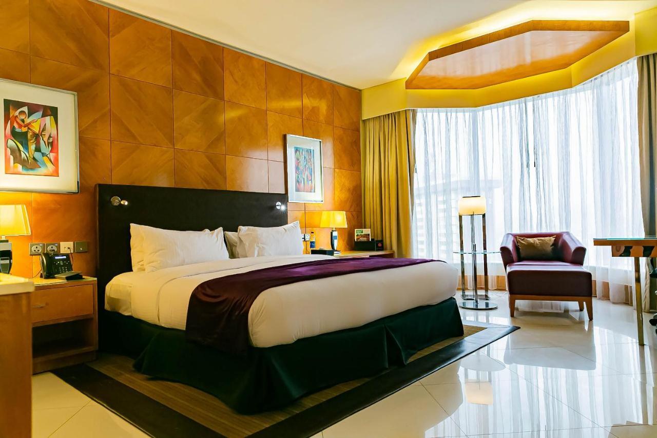 Lagos Continental Hotel Exterior foto A bedroom at the hotel
